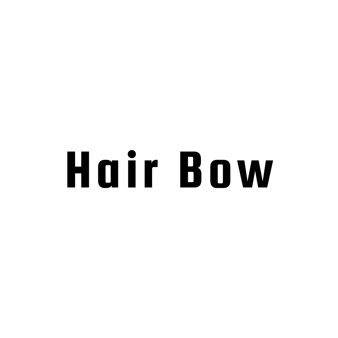 Bright yellow hair bows for girls made of smooth satin fabric with wide ribbon tails